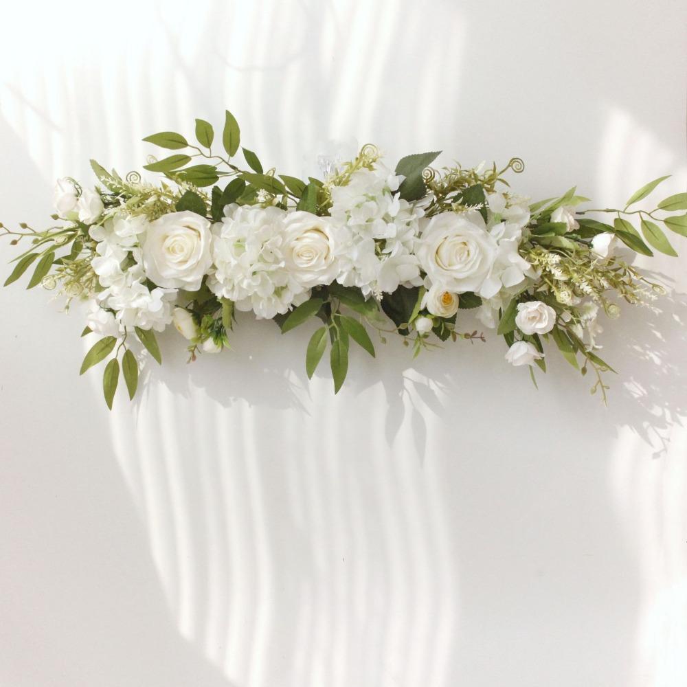 White artificial wedding arch flowers with greenery for ceremony sign decor